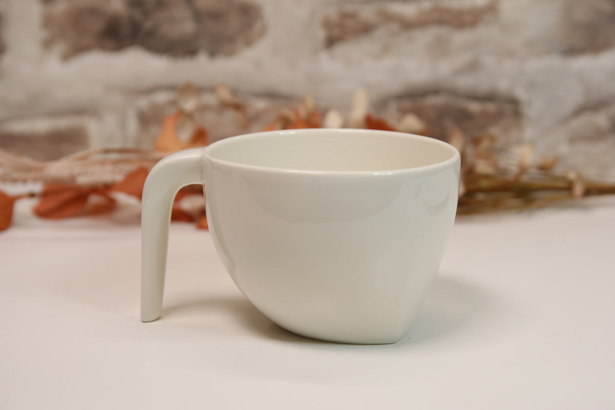 Iittala Ego iso kuppi lautasella Stefan Lindfors