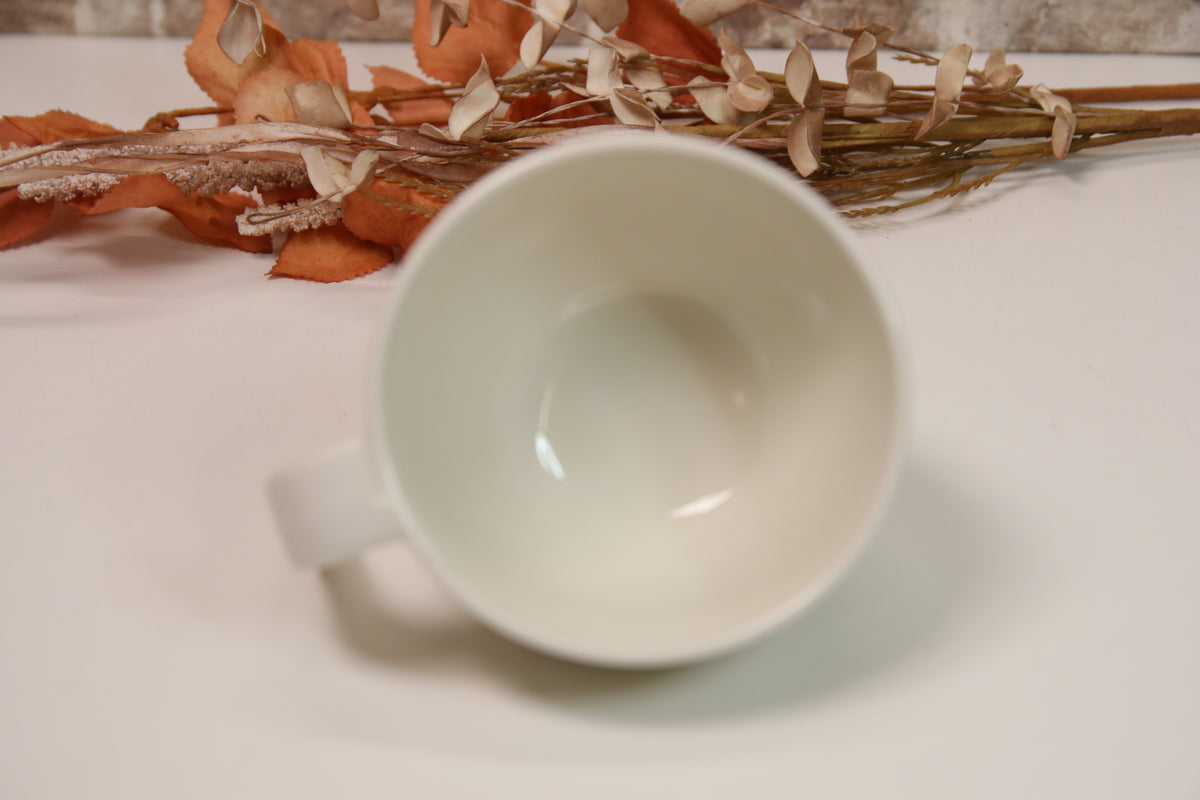 Iittala Ego iso kuppi lautasella Stefan Lindfors